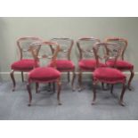 A set of six Victorian rosewood balloon back dining chairs (6)