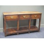 An 18th century oak and elm dresser base with three drawers and under tier, 82 x 146 x 41cm