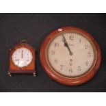 A modern mantle clock by Comitti in mahogany case 24cm high and a wall clock with hes movement
