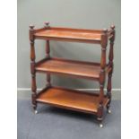 A Victorian mahogany rectangular buffet, with baluster turned supports, on white ceramic castors 108