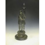 A bronze figure of a knight, 71cm