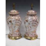 A pair of Chinese style gilt metal mounted porcelain lamps, of inverted baluster form, 48.5cm high