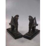 A pair of bronzed sphinx ornaments, 13 x 13cm