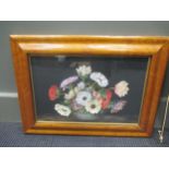 Two decoupage floral pictures by Claude Garnett in maple frames, the larger 38 x 51.5cm including
