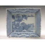 A Chinese export blue and white porcelain dish with shaped border, 31 x 38cm