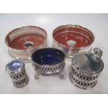 Two silver bottle coasters and a silver three piece condiment set (5)