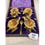 A cased set of four mid-Victorian gilt metal novelty salts in the form of flowers, with bead edged