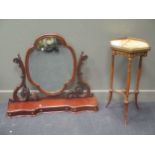 A Victorian mahogany dressing table mirror top, a reproduction French style stand with onyx top