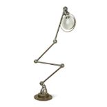 A Jieldé vintage industrial machinist's anglepoise desk lamp,