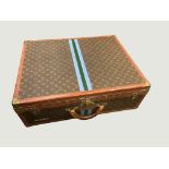 A Louis Vuitton monogrammed leather rigid suitcase,