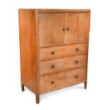 A Bath Cabinet Makers for Heal's Art Deco oak tallboy,