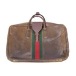 A Gucci soft brown leather suitcase,