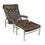 A buttoned leather and chrome lounge chair and ottoman,