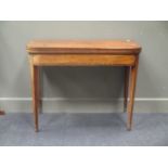 A George III mahogany card table, on tapering legs, 72 x 93 x 46cm