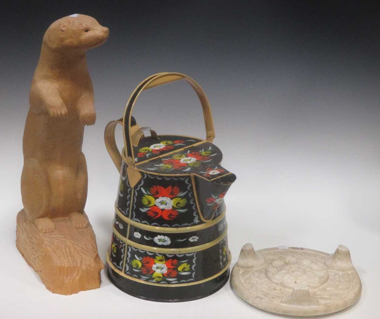 A large bargeware water jug, 35cm high with handle folded down, a carved Indian marble stand, and