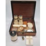 A 19th century ivory card case together with a 19th century set of binoculars, a cat form tape