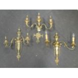 A pair of Neo-classical style two branch wall lights 53cm high together with a similar three