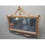 A giltwood mirror with rectangular plate, in the Regency style,