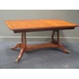 A Duncan Phyfe style dining table with one leaf including three folding table covers (table 74 x