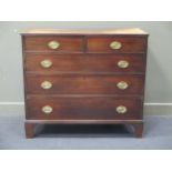 A Georgian mahogany chest of drawers, comprising of two short over three long graduating drawers