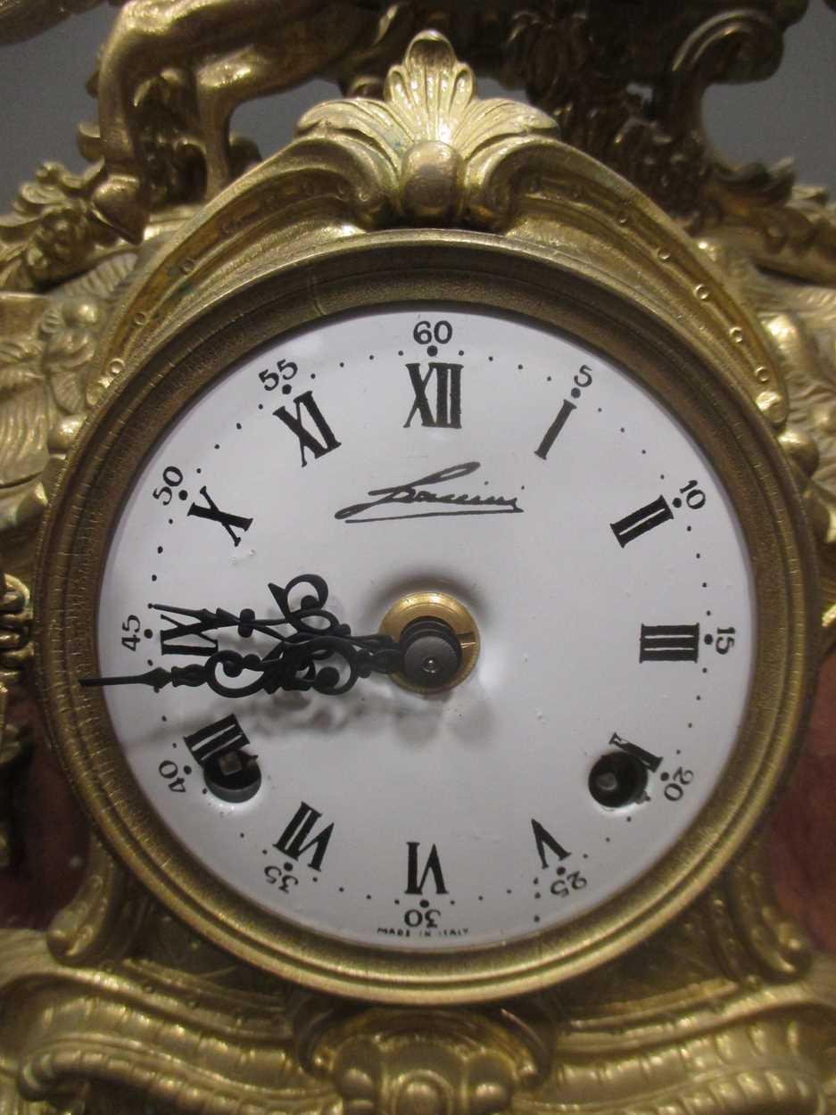 A brass clock garniture, the clock 41cm high, the candelabra 47cm high - Image 2 of 6