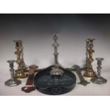 Four various silver plated candlesticks, a pair of brass candlesticks and a pair of pewter