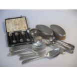 A collection of silver flatware together with a napkin ring and miniature trophy and a pair of
