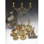 A pair of 18th Century cast brass candle sticks, a three-tier brass candelabrum and other brass