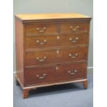 A Georgian mahogany and pine chest of drawers, comprising of two short over three long cockbeaded