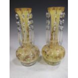 A pair of early 20th century glass lustres vases, 28cm high