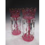 A pair of Edwardian Bohemian cranberry glass lustres, 39cm high