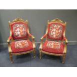 A pair of Italian style large gilt armchairs, 107cm high