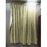 Two pairs of pale green damask foliate pattern lined and weighted curtains and four tie backs,