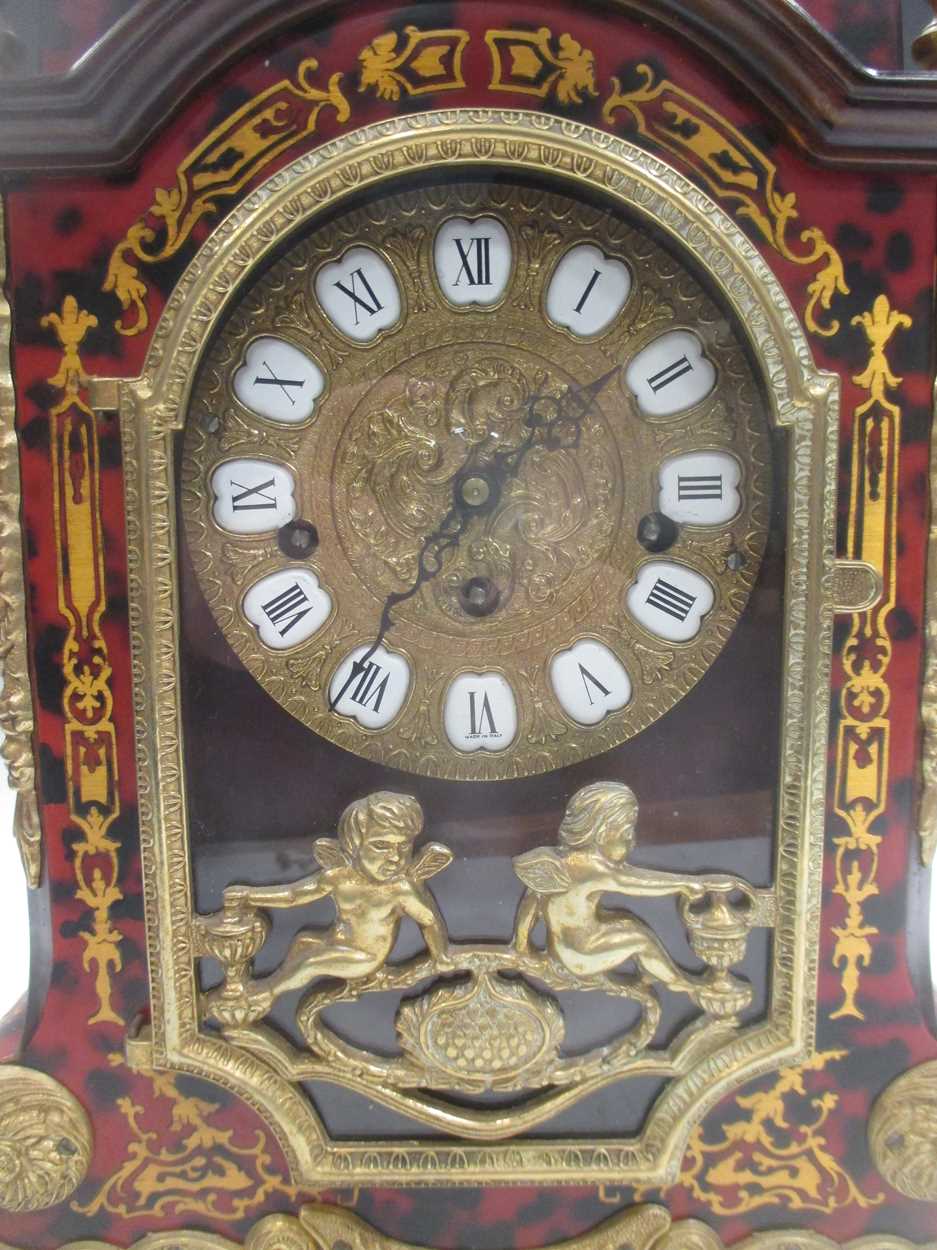 A Boulle mantel clock, surmounted by a cherub, 54cm high - Image 2 of 8