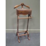 A 20th century gentleman's hardwood valet stand, 124cm high