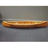 A modern scale model long boat, made using nailed pine planks, approx. 140cm