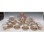 Collection of Crown Derby tea cups, coffee cups, saucers, plates, tea pot and milk jug