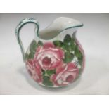 A Wemyss jug with floral decoration 23cm high