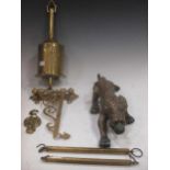 A Victorian brass spit jack, a brass leopard and other items