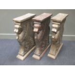 A set of three eastern carved hardwood table stands, 77 x 59 x 18cm