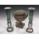 A pair of nautical style pricket candlesticks with ribbed glass column and rope effect decoration