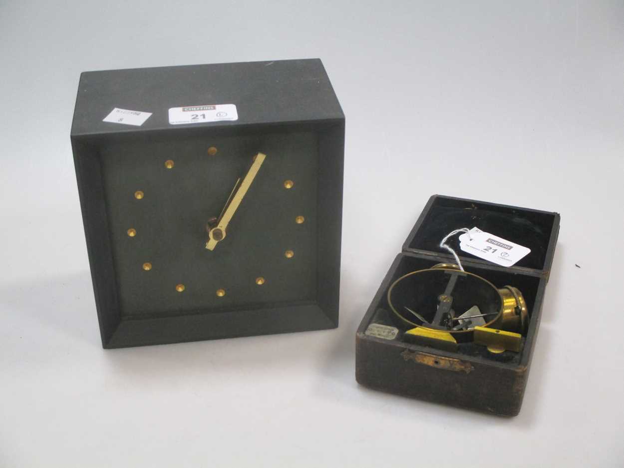 A Welsh slate cased batery clock and a German brass anemometer (wind speed measuring device)