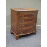 A George III style serpentine chest of five long drawers, with brush slide, 78 x 70 x 48cm
