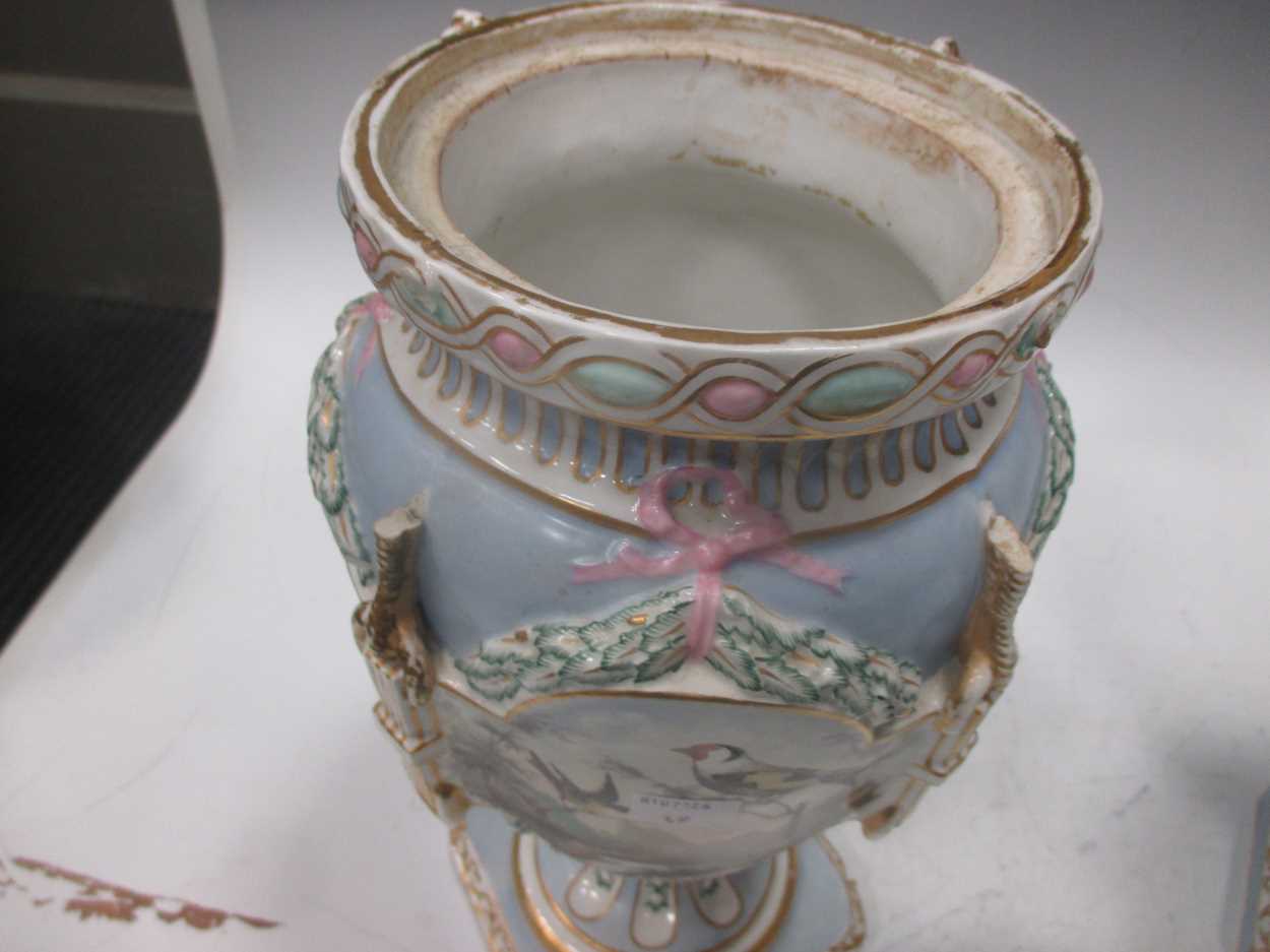 A pair of Continental porcelain pale blue ground vases, 19th Century (lacking covers), applied - Image 4 of 9