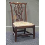 A George III style mahogany child’s dining chair, with interlaced back splat and ‘parrot’ floral