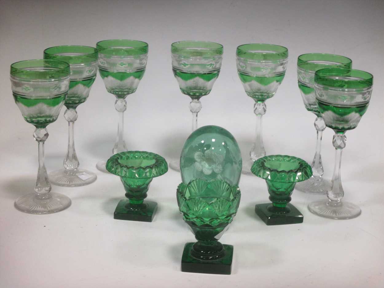 Collection of cut glassware: 7part green coloured wine glasses; 3 small green salts or vases;