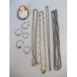 A collection of jewellery including two 9ct gold chains, 18.7g, a cameo brooch, a single earring,