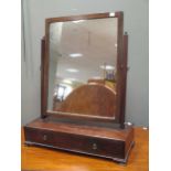 A 19th century mahogany rectangular dressing table mirror, on rectangular base 55cm wide; and