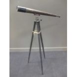A military brass telescope on stand, stamped with Broadarrow, PATT 333, 1941 No 1607, 109cm long