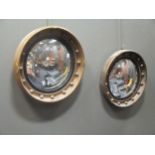 Two similar Regency style gilt framed convex circular wall mirrors, 43cm diameter (20.3)